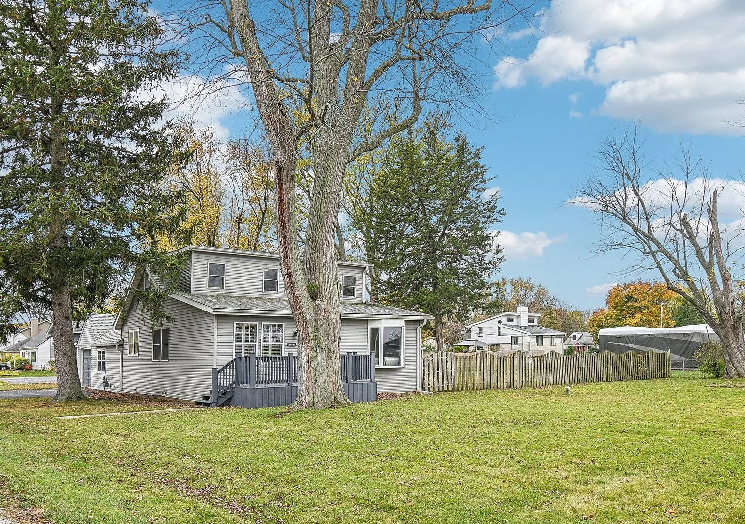 Rear exterior and large yard of the Lake Villa home