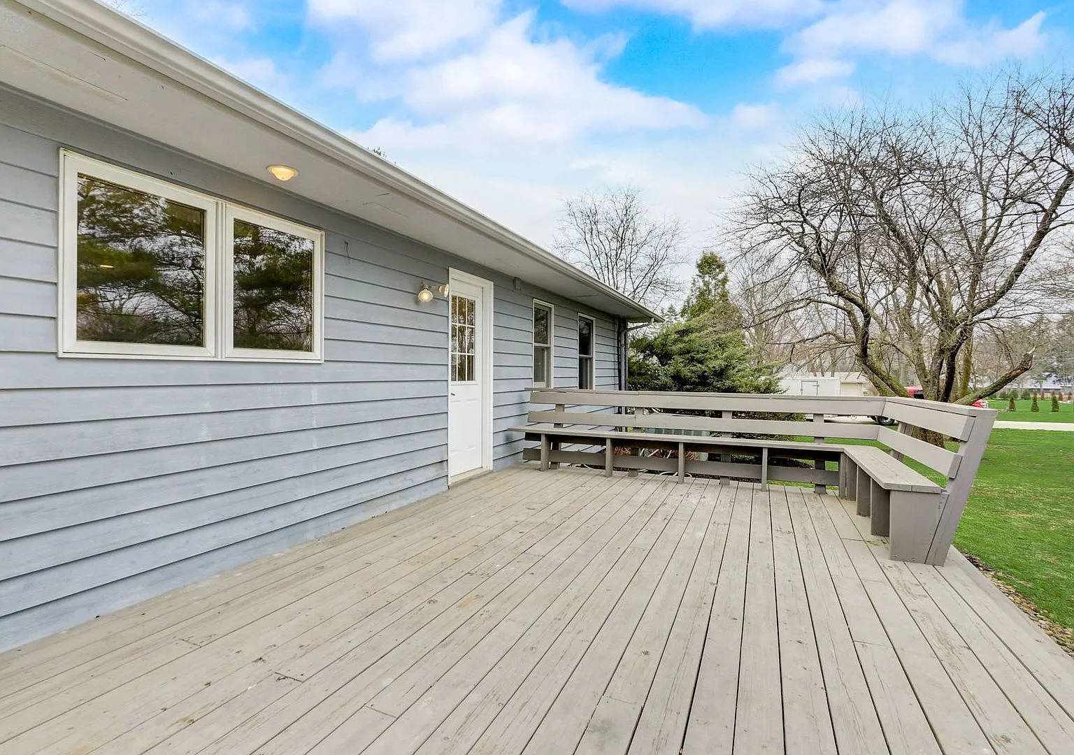 Rear deck and backyard of the Grayslake ranch after renovation
