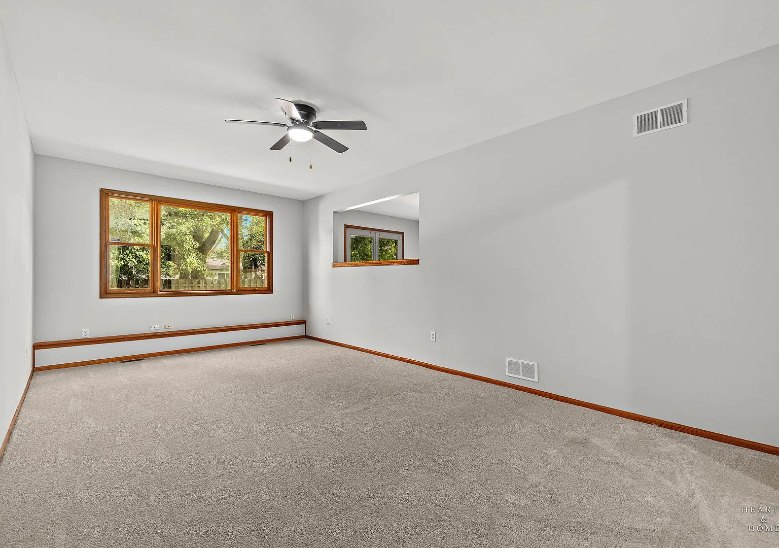 Living area with new carpet and fresh paint, Harvard IL case study