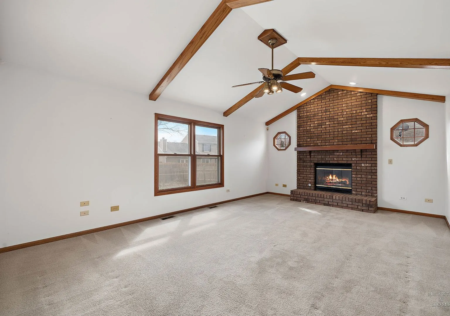 Family room with brick fireplace and vaulted ceiling, 2176 Jordan Ln Elgin
