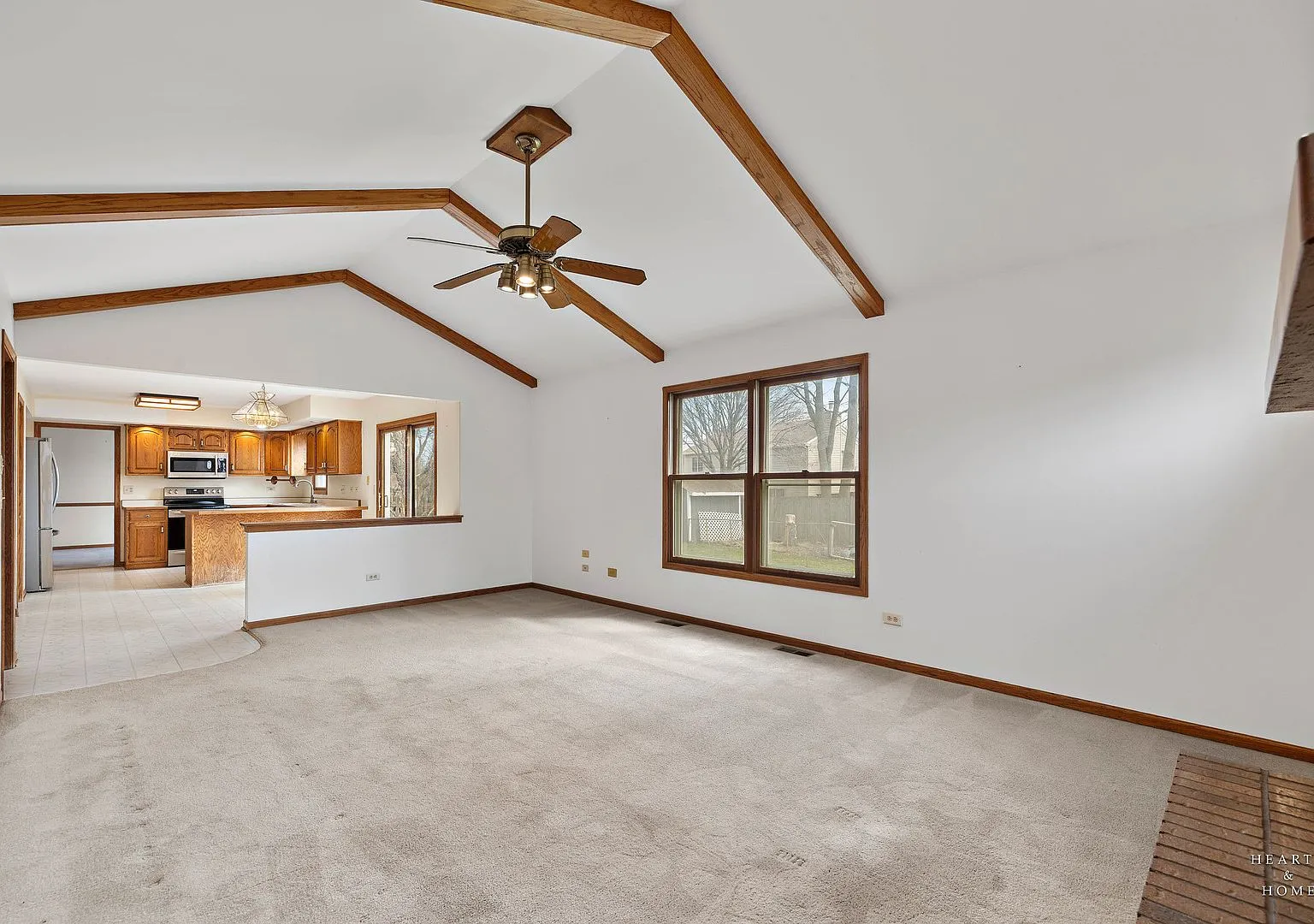 Vaulted living area opening to the kitchen after cleaning and touch-up paint, Elgin IL