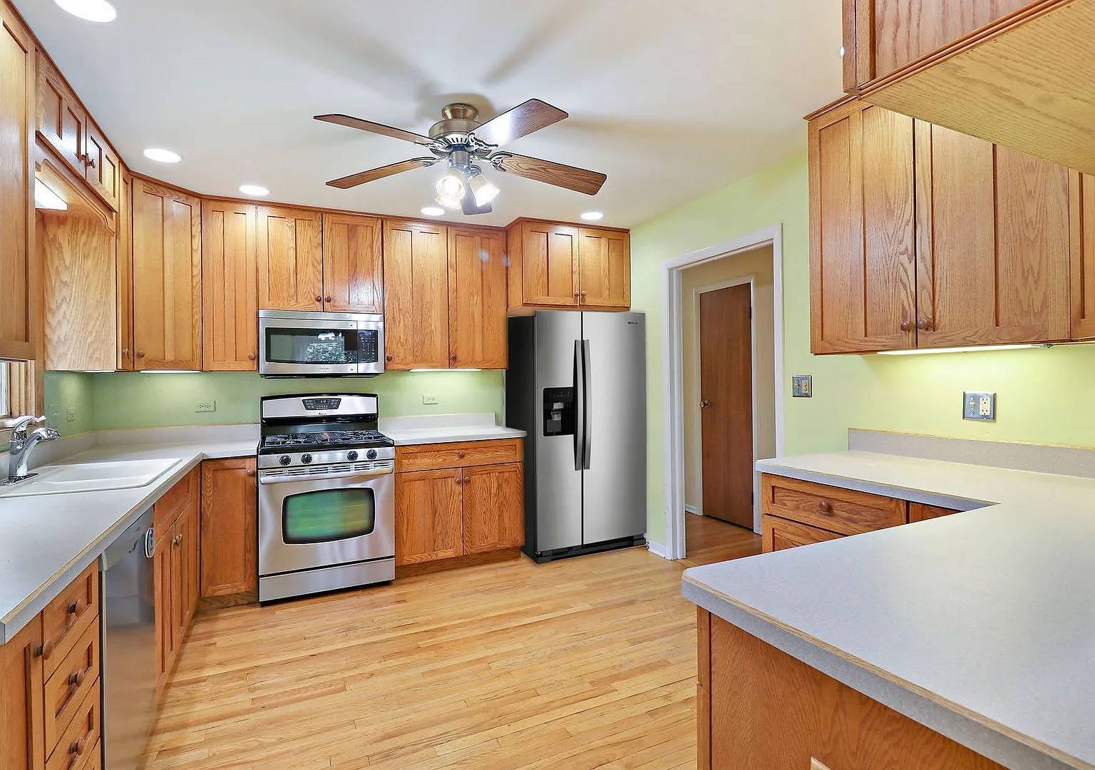 Original oak kitchen with stainless appliances, 245 Wellington Dr Crystal Lake