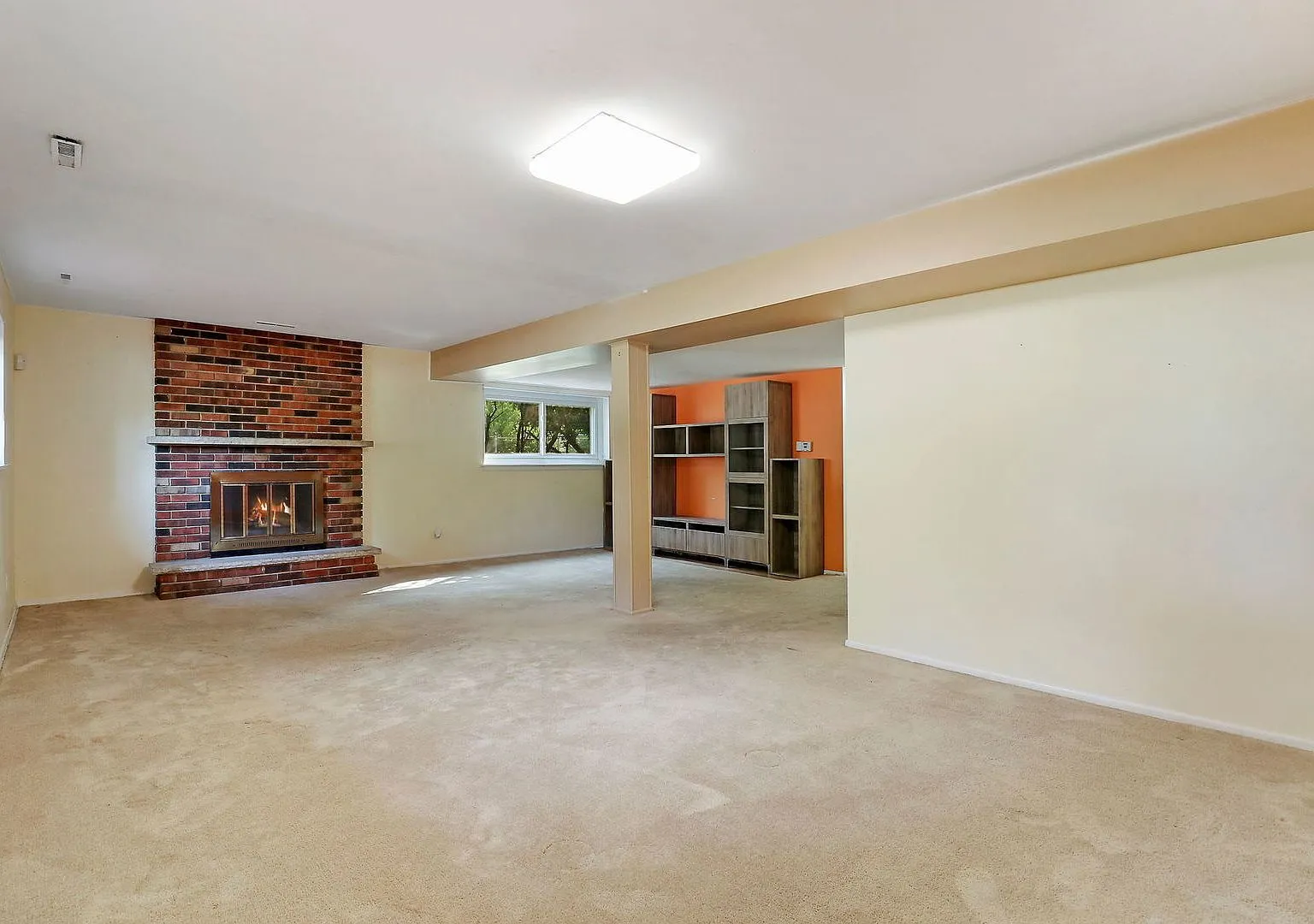 Lower-level family room with brick fireplace, Crystal Lake IL case study