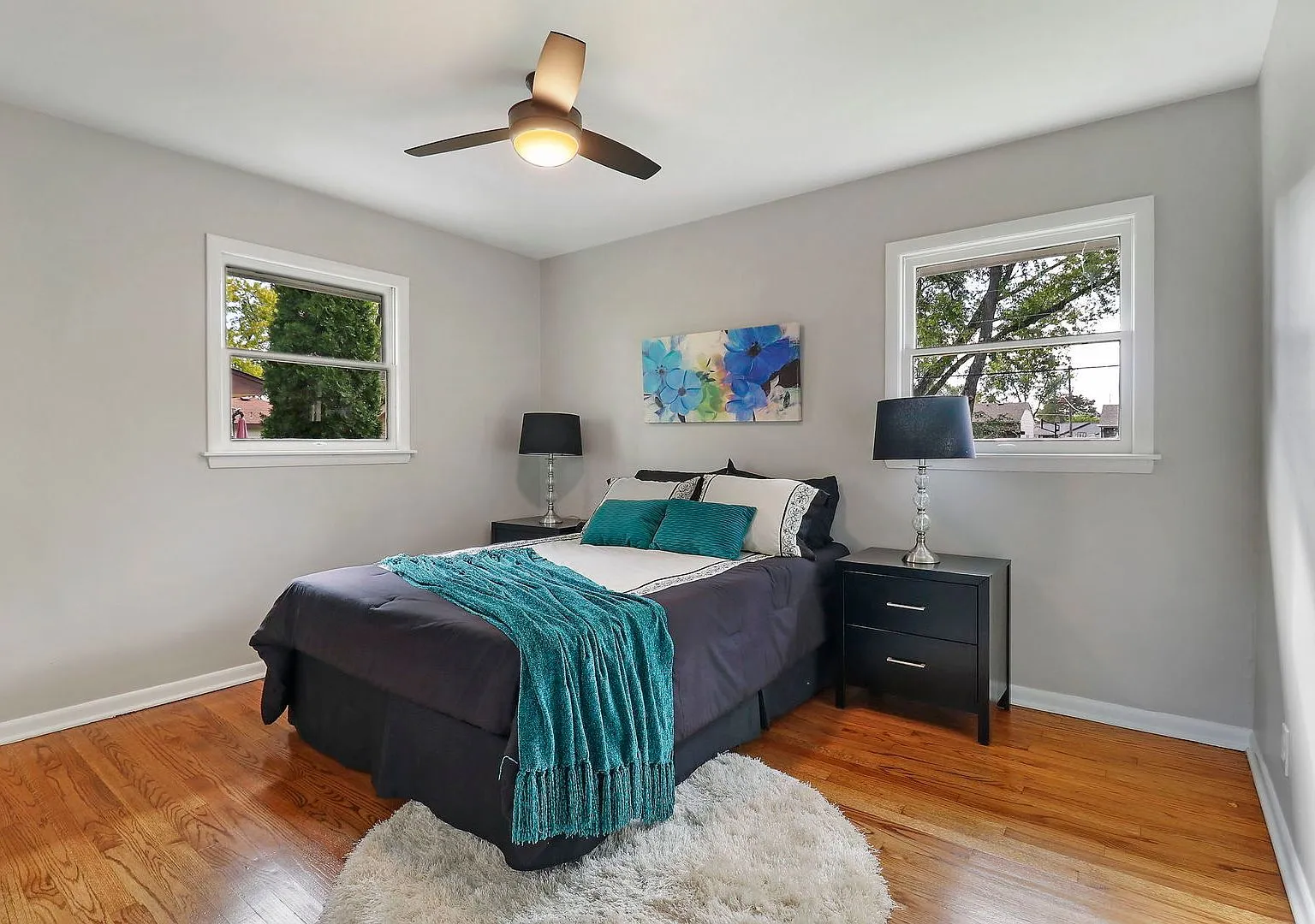 Staged bedroom after completed renovation, 111 Wagner Dr