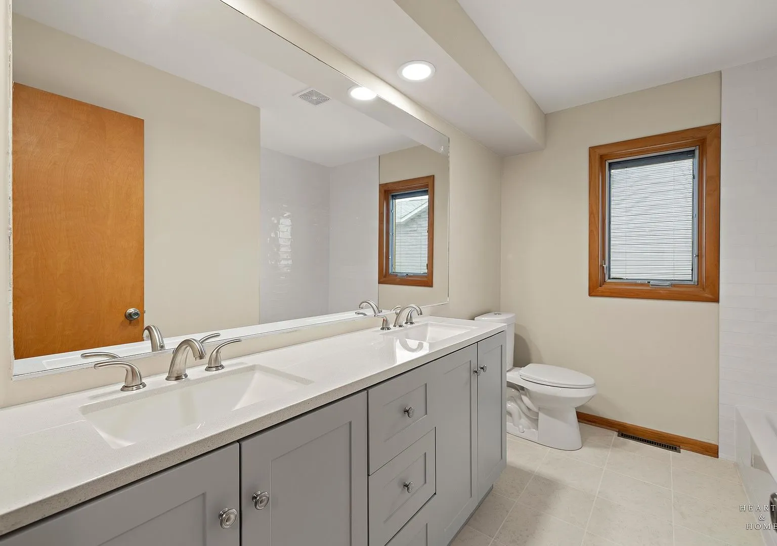 Bathroom with double vanity after touch-ups, Huntley IL inherited house case study