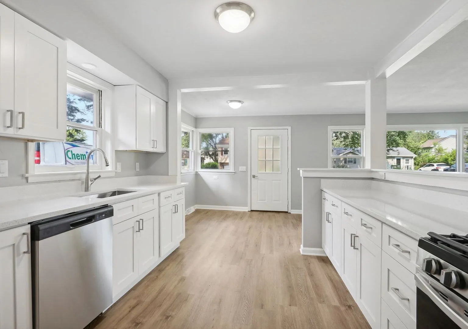 Completed white kitchen with stainless appliances, 5506 Oakwood Dr Cary