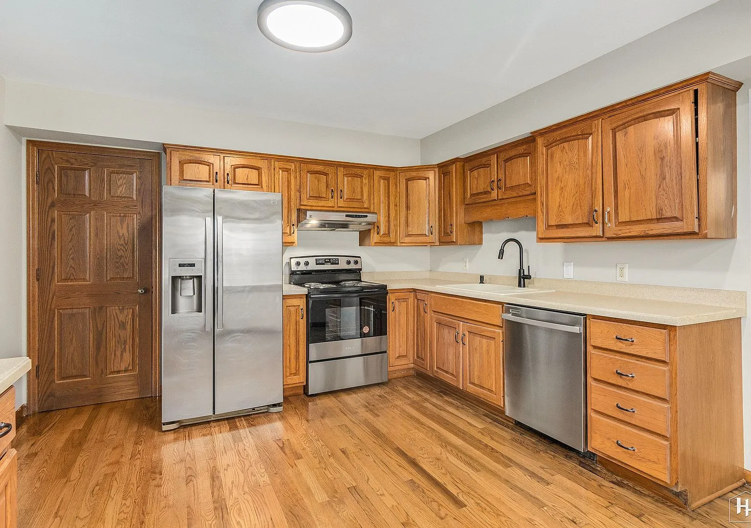 Oak kitchen with stainless appliances and new counters, Woodstock IL