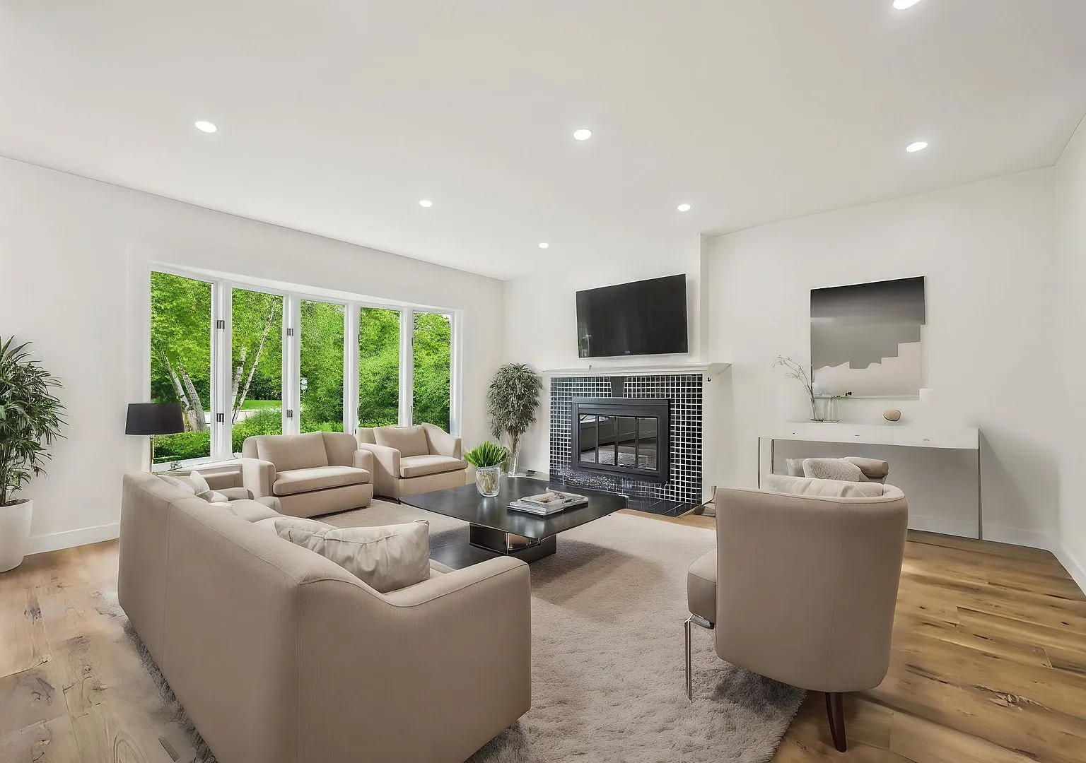 Staged living room with large windows after renovation, Libertyville IL case study