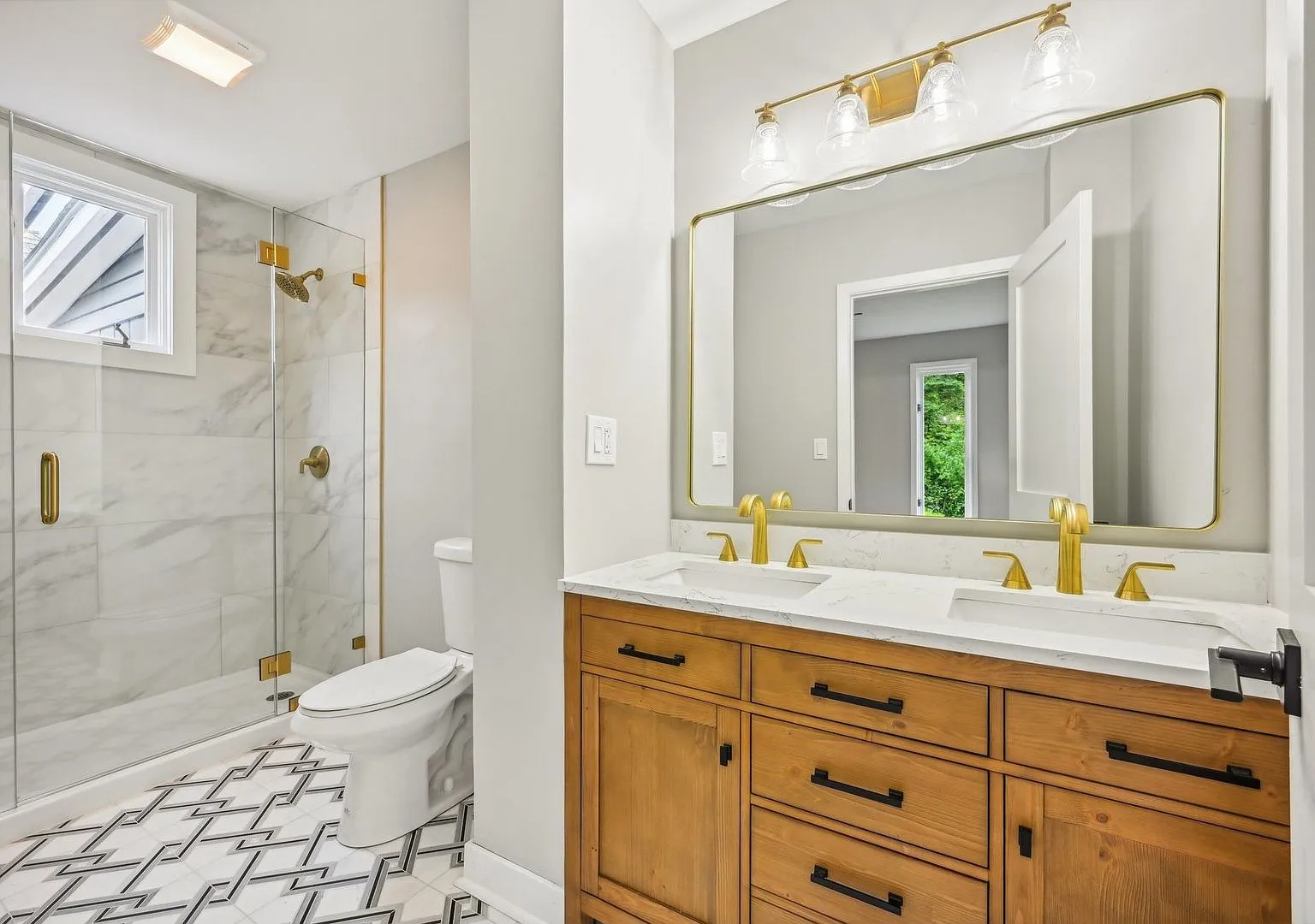 Remodeled bathroom with marble tile shower and new vanity, Libertyville IL
