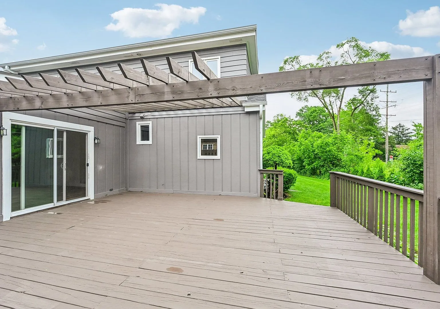 Backyard deck with pergola at the renovated Libertyville home